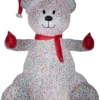 Gemmy Animated Airblown Inflatable Hugging Candy Sprinkles Bear W/Santa Hat And Scarf Giant, 8.5 Ft Tall