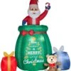 Gemmy Giant Animated Christmas Airblown Inflatable Inflatable Santa In A Gift Bag, 10 Ft Tall, Green