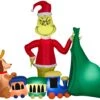 Gemmy Christmas Airblown Inflatable Grinch Putting Train In Santa Sack Scene Dr. Seuss, 6.5 Ft Tall