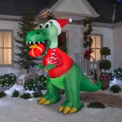 Gemmy Christmas Airblown Inflatable T Rex W/Gift, 7.5 Ft Tall, Green -Gemmy 881903 Lifestyle