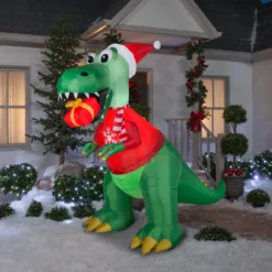 Gemmy Christmas Airblown Inflatable T Rex W/Gift, 7.5 Ft Tall, Green -Gemmy 881903 Lifestyle scaled